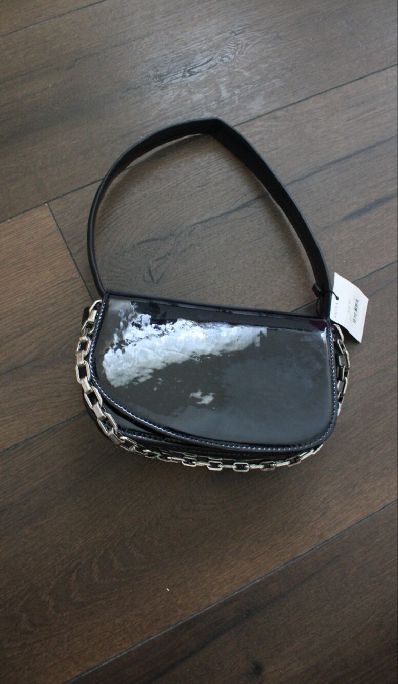 AKIRA Leather Chain-Accent Shoulder Bag in Black
